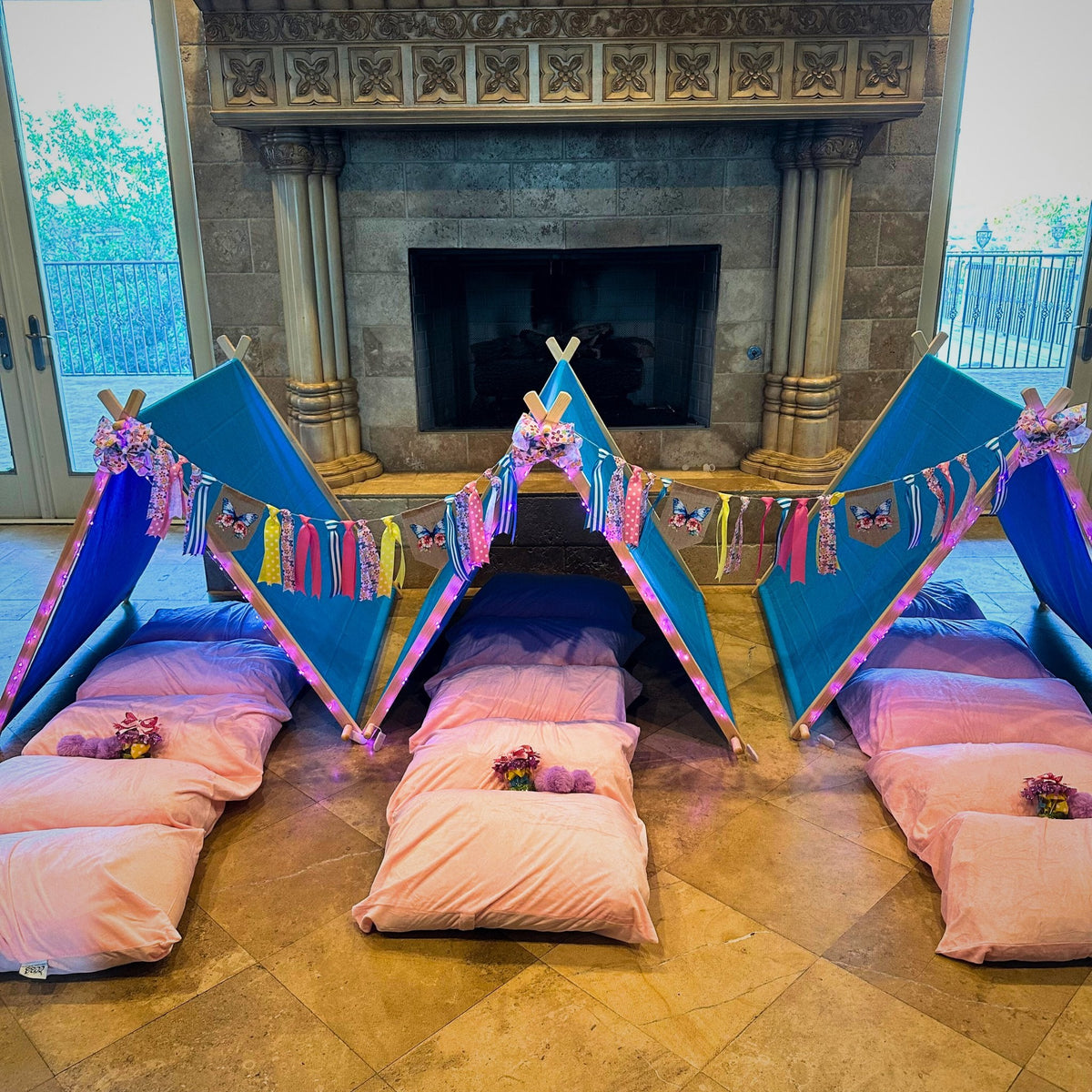 Butterfly Birthday Sleepover Kit: blue butterfly teepees with pink cushions and colorful ribbons on Tampa Home & Garden Store