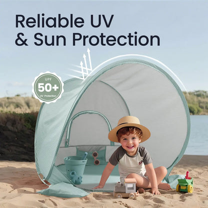 Tiny Land One-Stop Beach Toy & Tent Set pop-up beach tent in teal, child plays in sand on Tampa Home & Garden Store