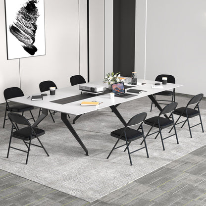 Folding conference chairs 4-pack with padded seats, black, DirectDeals, arranged around a long conference table on Tampa Home & Garden Store