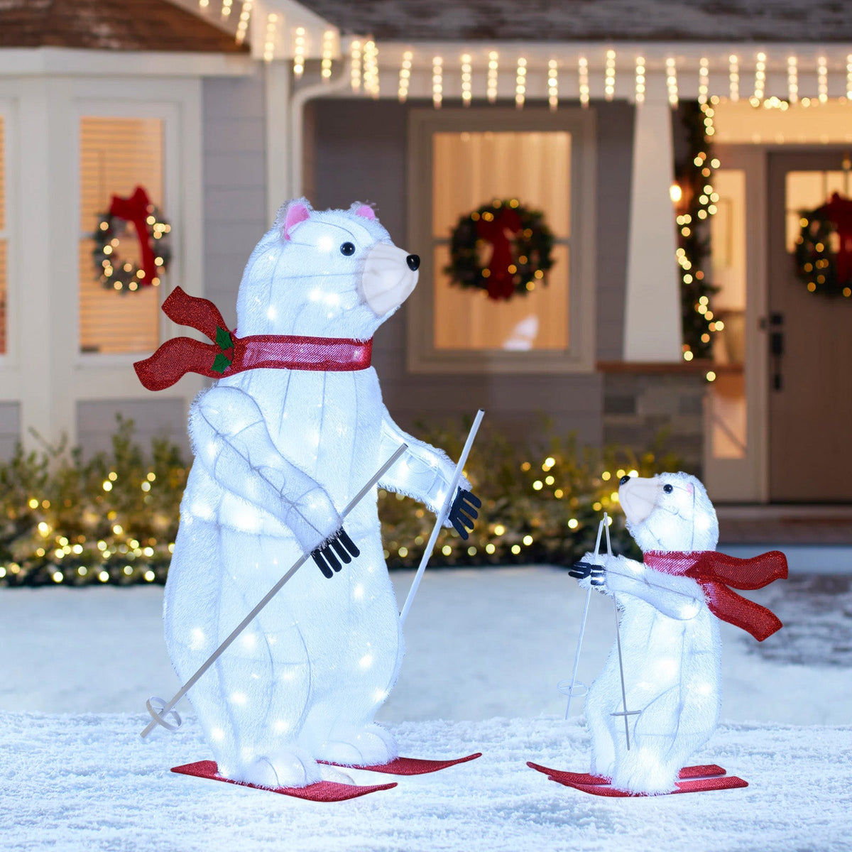 2-pc animated skiing polar bear decorations with LED lights, red scarves and skis DirectDeals on Tampa Home & Garden Store