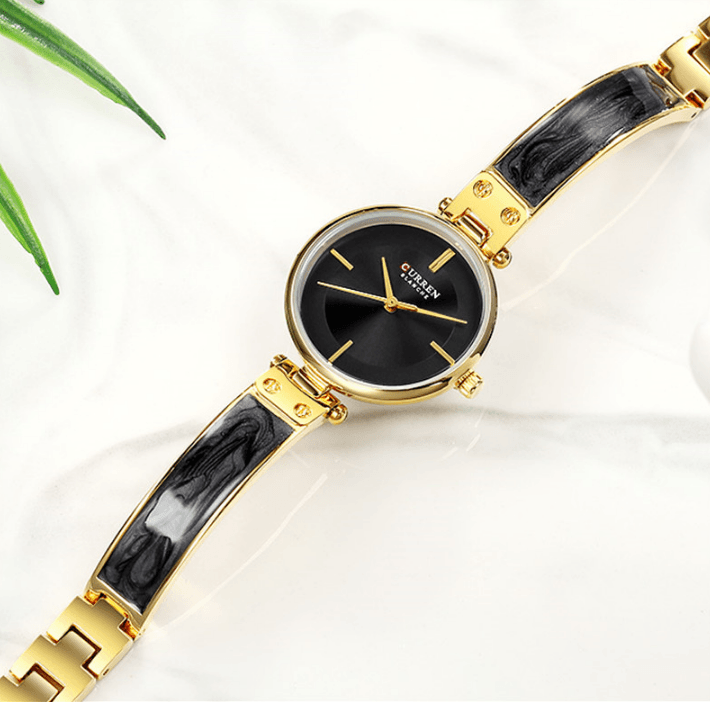 Womens Elegant Stainless Steel Watch With Ceramic Marble Bracelet, gold case, black dial on Tampa Home & Garden Store