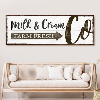 Canvas sign Farm Fresh Milk & Cream Co with distressed white wood panel and brown frame on Tampa Home & Garden Store