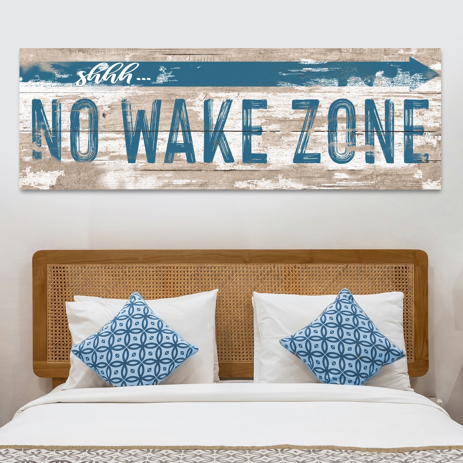 Canvas No Wake Zone XIV by Tailored Canvases with rustic wood backdrop and blue text above bed on Tampa Home & Garden Store