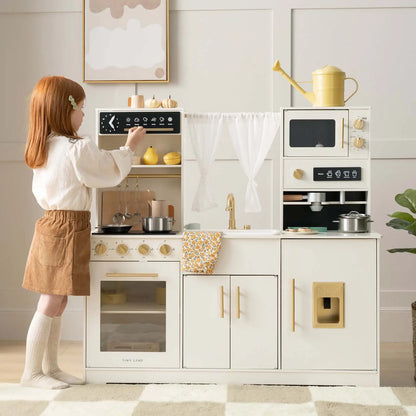 Tiny Land play kitchen with running water in cream and aqua; stove, sink, microwave on Tampa Home & Garden Store