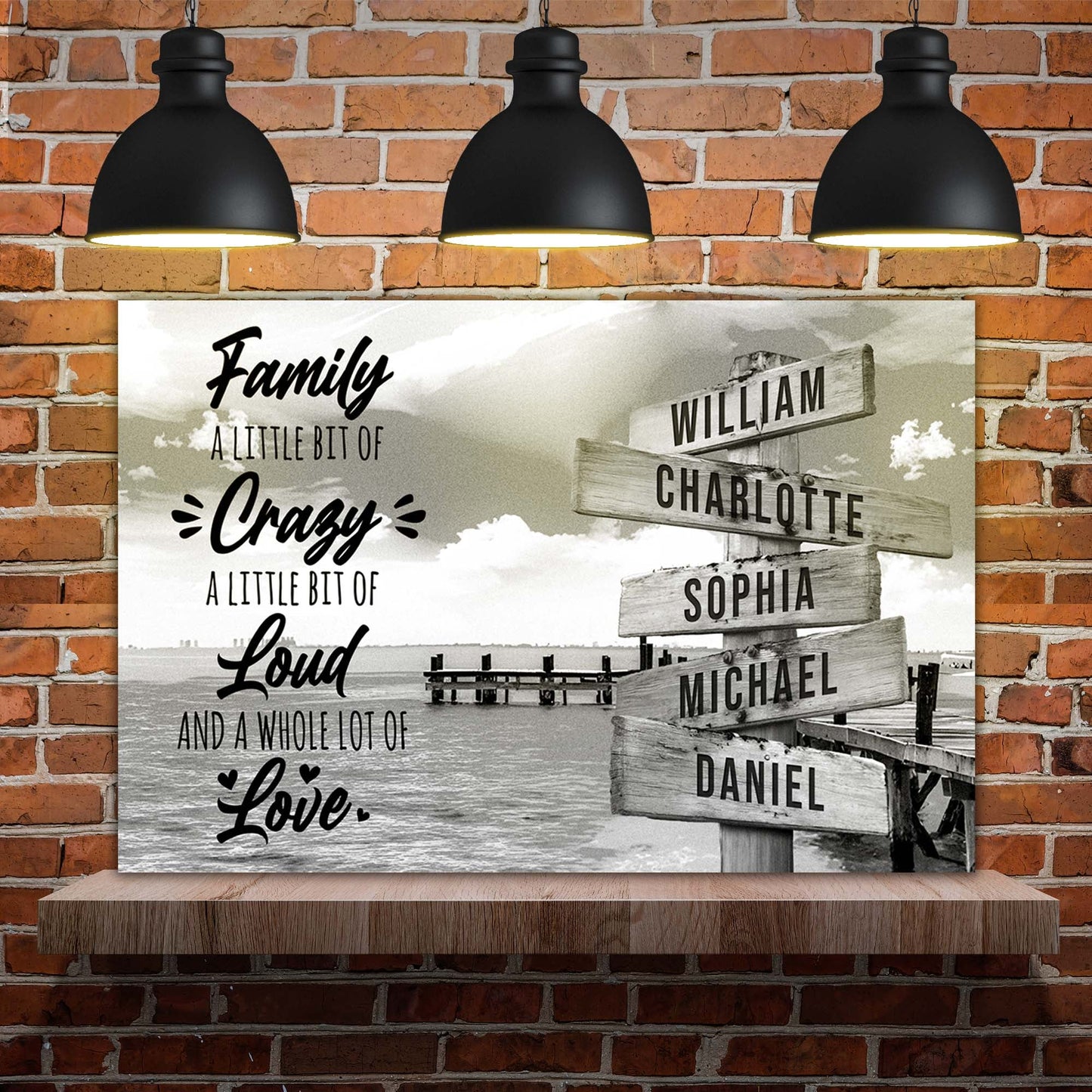A Lot of Love Family Names Sign canvas by Tailored Canvases with three black pendant lights on Tampa Home & Garden Store