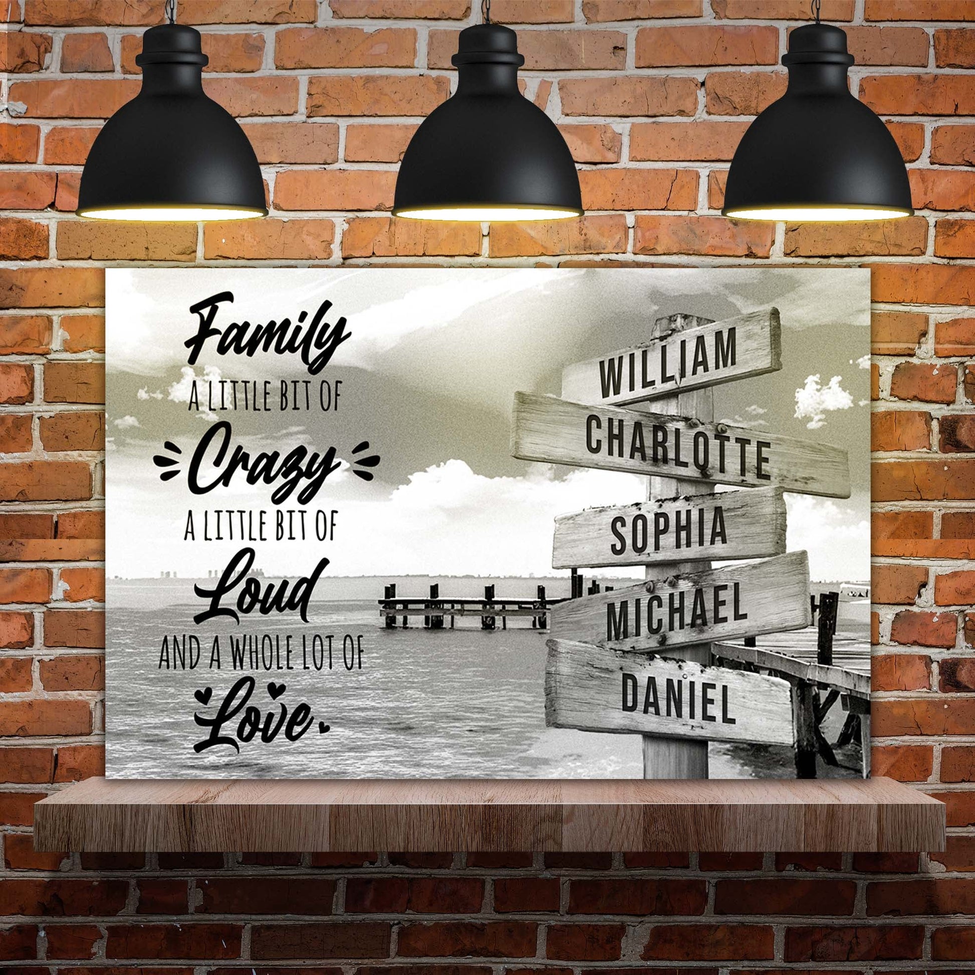 A Lot of Love Family Names Sign canvas by Tailored Canvases with three black pendant lights on Tampa Home & Garden Store