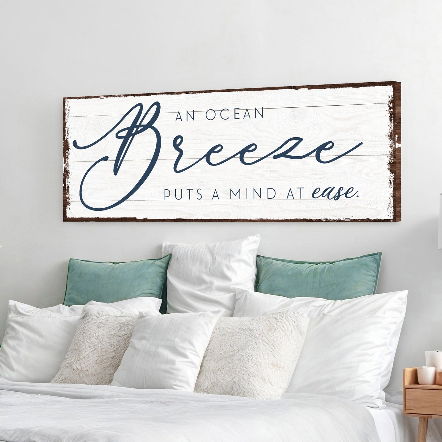 An Ocean Breeze Puts A Mind At Ease Sign canvas with navy script Breeze on whitewashed wood on Tampa Home & Garden Store