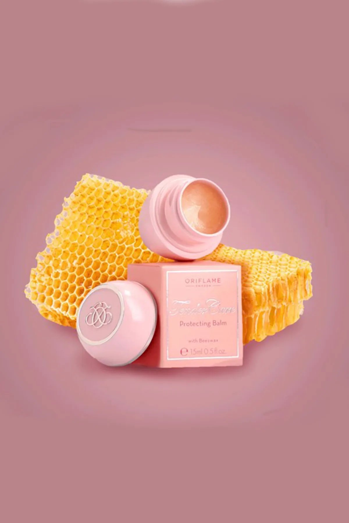 Tender Care Protecting Balm pink jar by Oriflame with honeycomb backdrop on Tampa Home & Garden Store