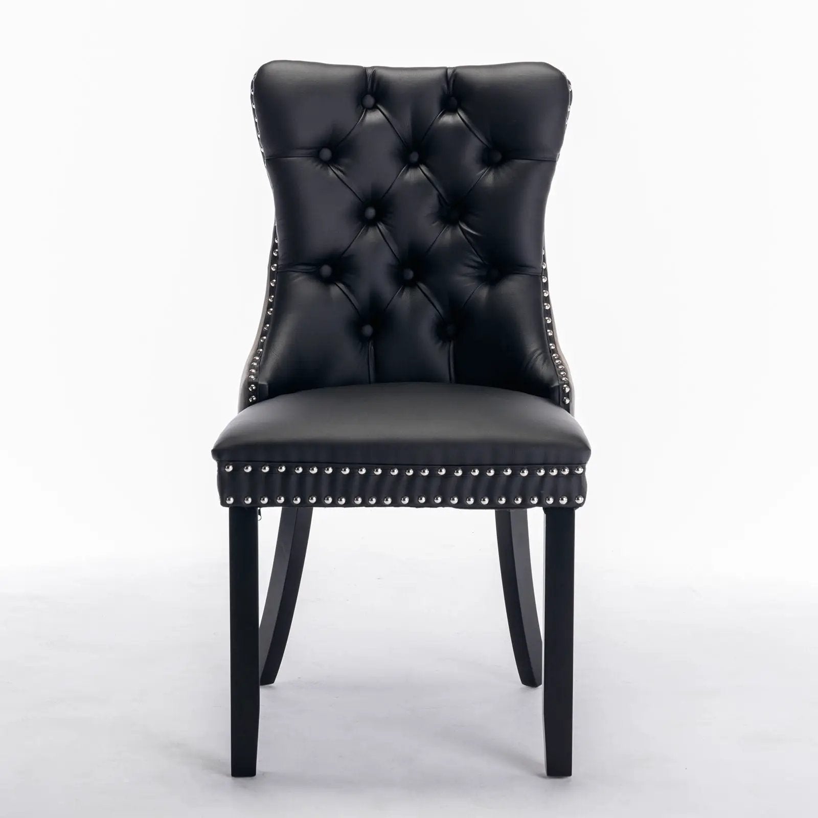 Nikki Upholstered Dining Chair set of 2 in black faux leather with tufted back and nailhead trim on Tampa Home & Garden Store