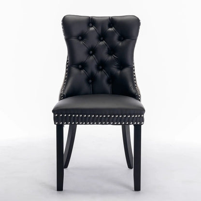 Nikki Upholstered Dining Chair set of 2 in black faux leather with tufted back and nailhead trim on Tampa Home & Garden Store