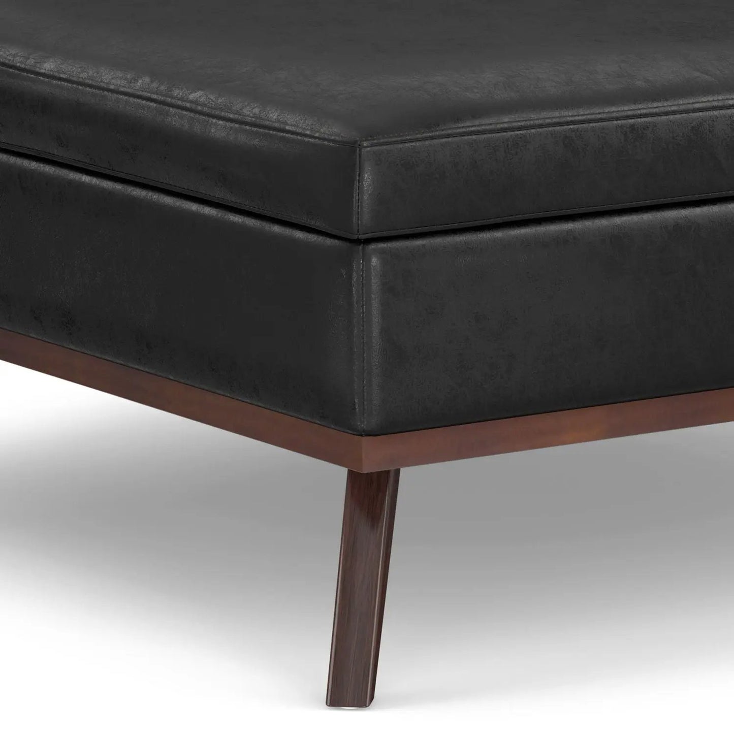 Owen square coffee table storage ottoman in black faux leather with wood legs on Tampa Home & Garden Store