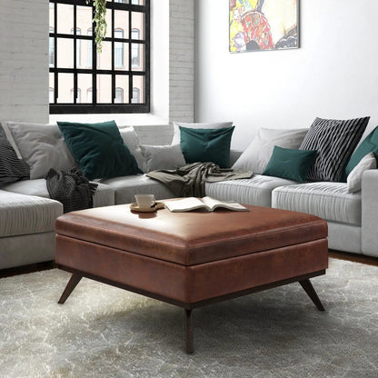 Owen multifunctional square coffee table storage ottoman in brown leather with tapered legs on Tampa Home & Garden Store