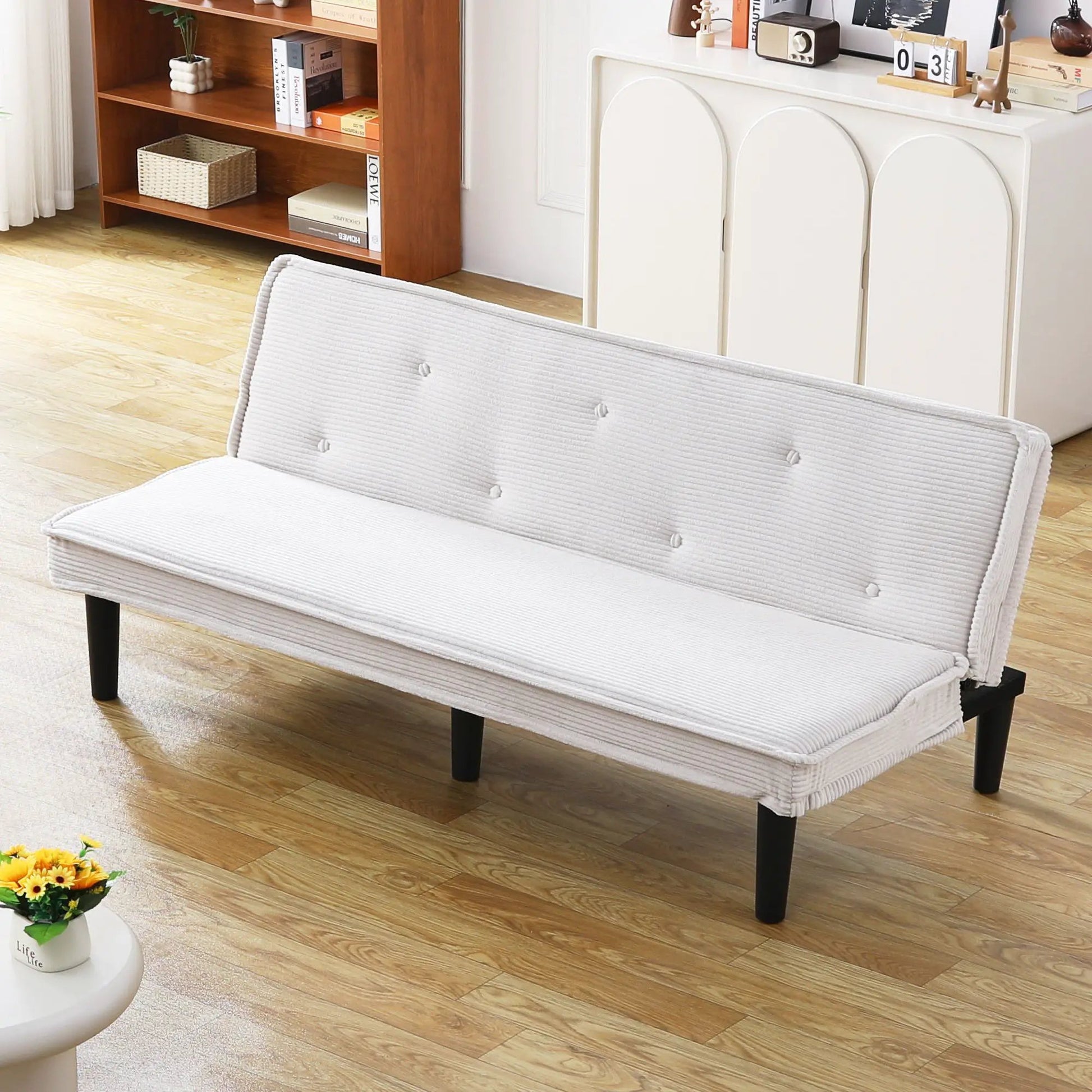 Versatile sofa bed with solid wood frame; light gray upholstery and tufted cushions on Tampa Home & Garden Store