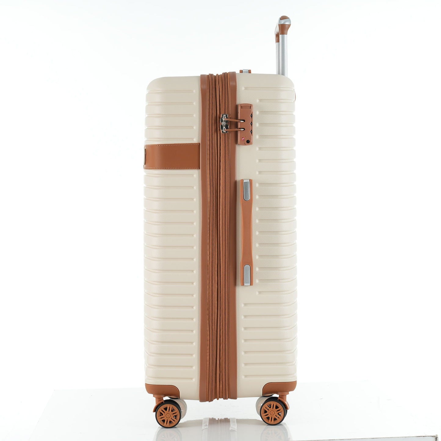 HouseOfZazla hard shell beige suitcase with brown strap, built-in lock, and spinner wheels on Tampa Home & Garden Store
