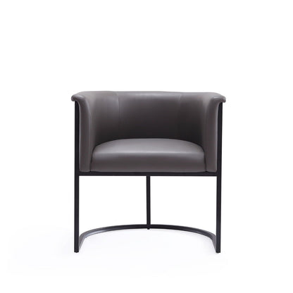 Cosmopolitan dining chair with grey faux-leather seat and back, geometric black metal frame on Tampa Home & Garden Store