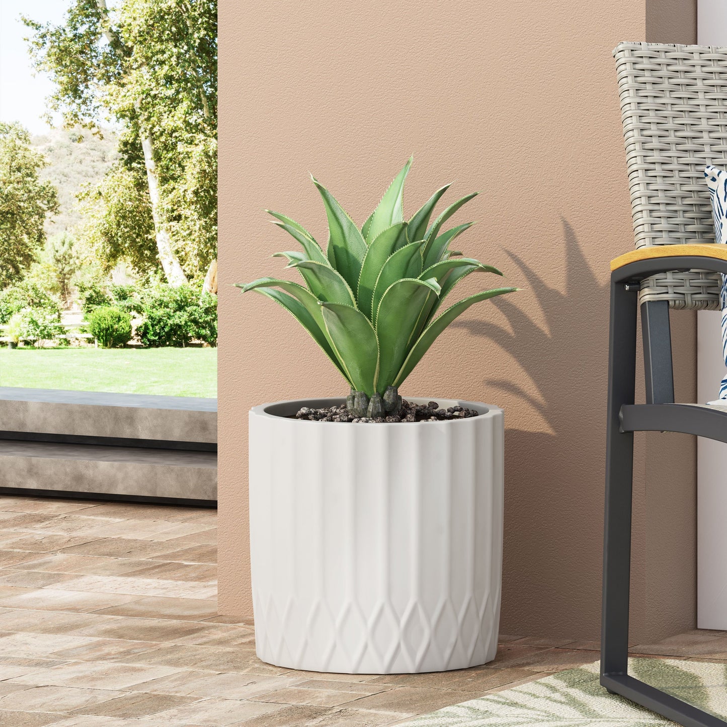 MGO planter white ribbed ceramic pot with agave on a patio against peach wall HouseOfZazla on Tampa Home & Garden Store