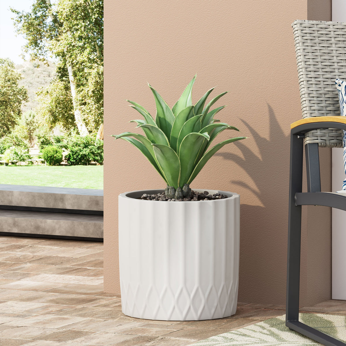 MGO planter white ribbed ceramic pot with agave on a patio against peach wall HouseOfZazla on Tampa Home & Garden Store