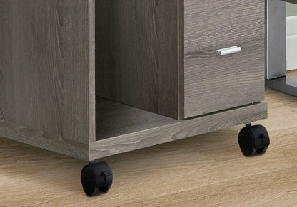 Filing cabinet in dark wood grain with silver drawer pull and rolling casters on Tampa Home & Garden Store