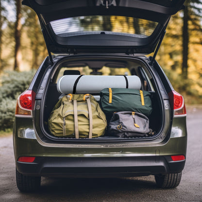 Memory Foam Camping Mattress gray rolled pad with water-resistant cover in SUV trunk on Tampa Home & Garden Store