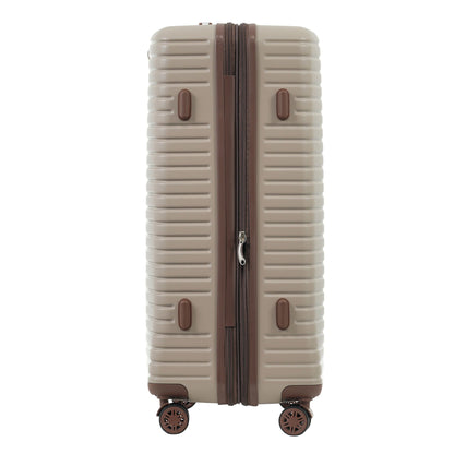 Beige hard-shell suitcase with brown trim and dual zippers on four spinner wheels on Tampa Home & Garden Store