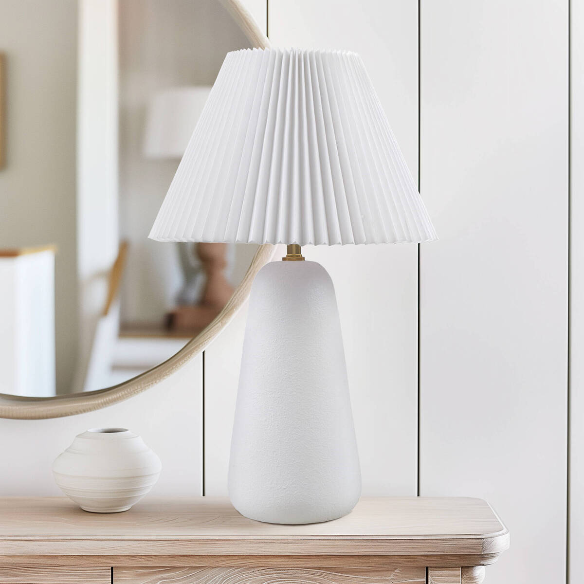Textured ceramic table lamp with white fluted fabric shade and smooth cone base on Tampa Home & Garden Store