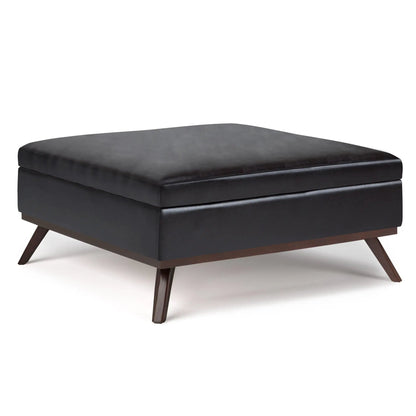 Owen coffee table storage ottoman in black faux leather with legs by Unique Piece Furniture on Tampa Home & Garden Store