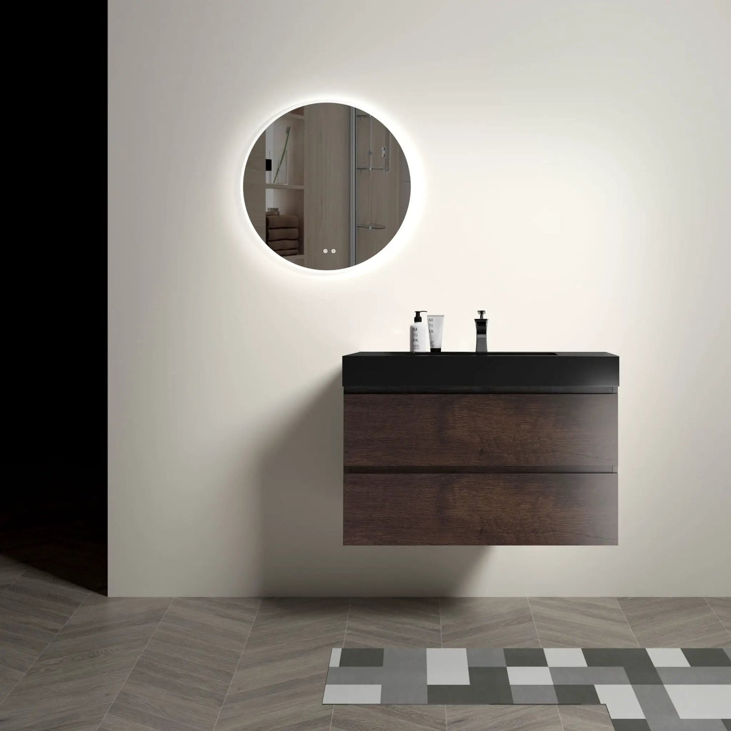 Alice wall-mounted vanity, dark wood cabinet, black countertop, round backlit mirror on Tampa Home & Garden Store
