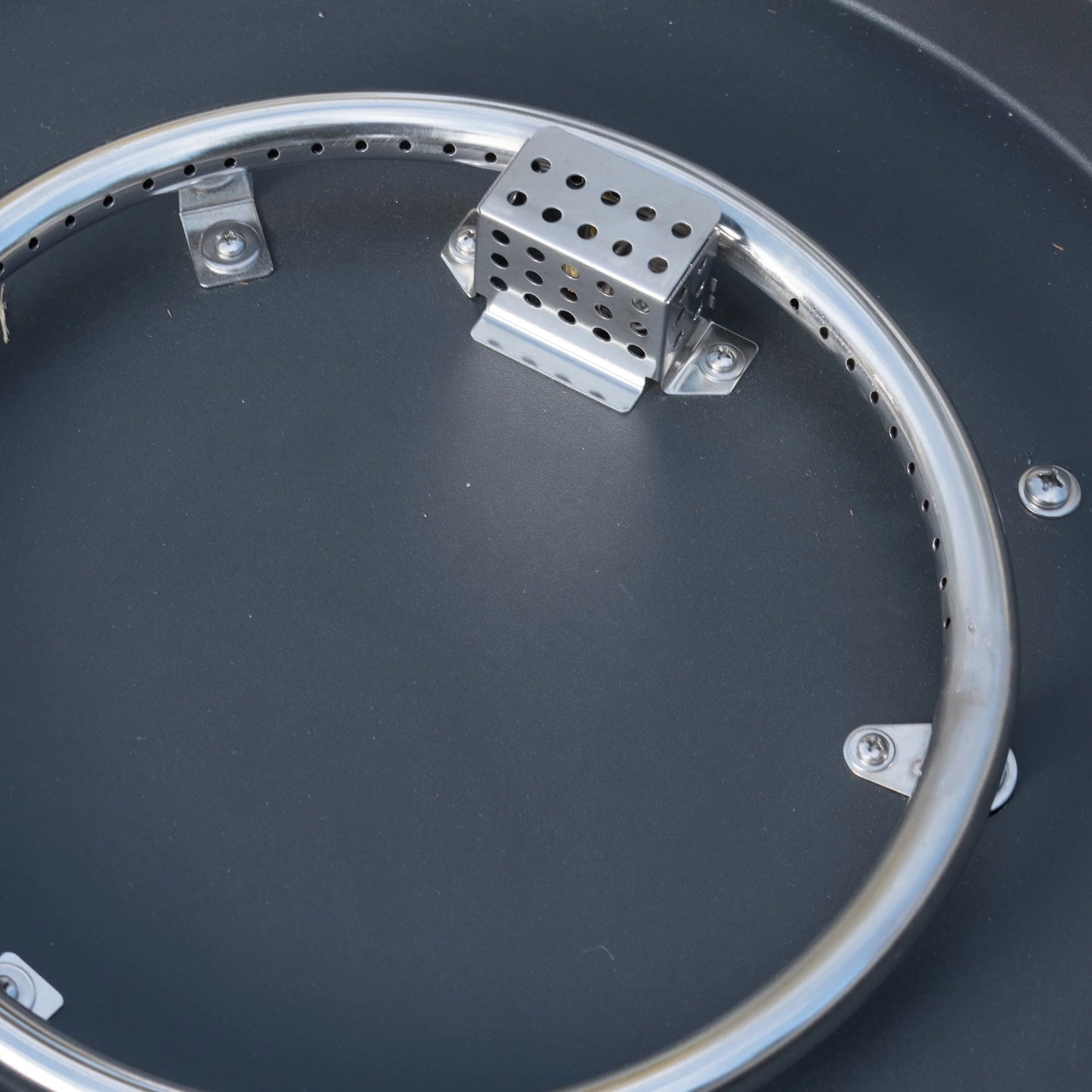 Outdoor fire pit burner assembly in dark grey metal with perforated housing HouseOfZazla on Tampa Home & Garden Store