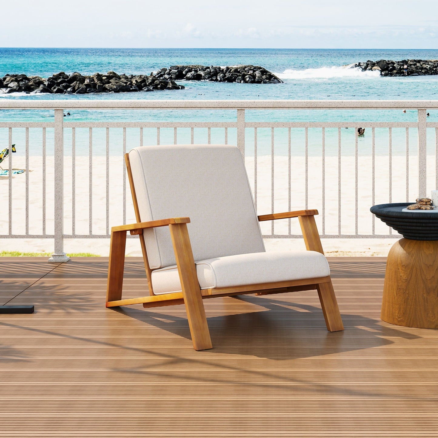 Outdoor patio lounge chair with beige fabric cushion and light wood frame on a beach deck on Tampa Home & Garden Store