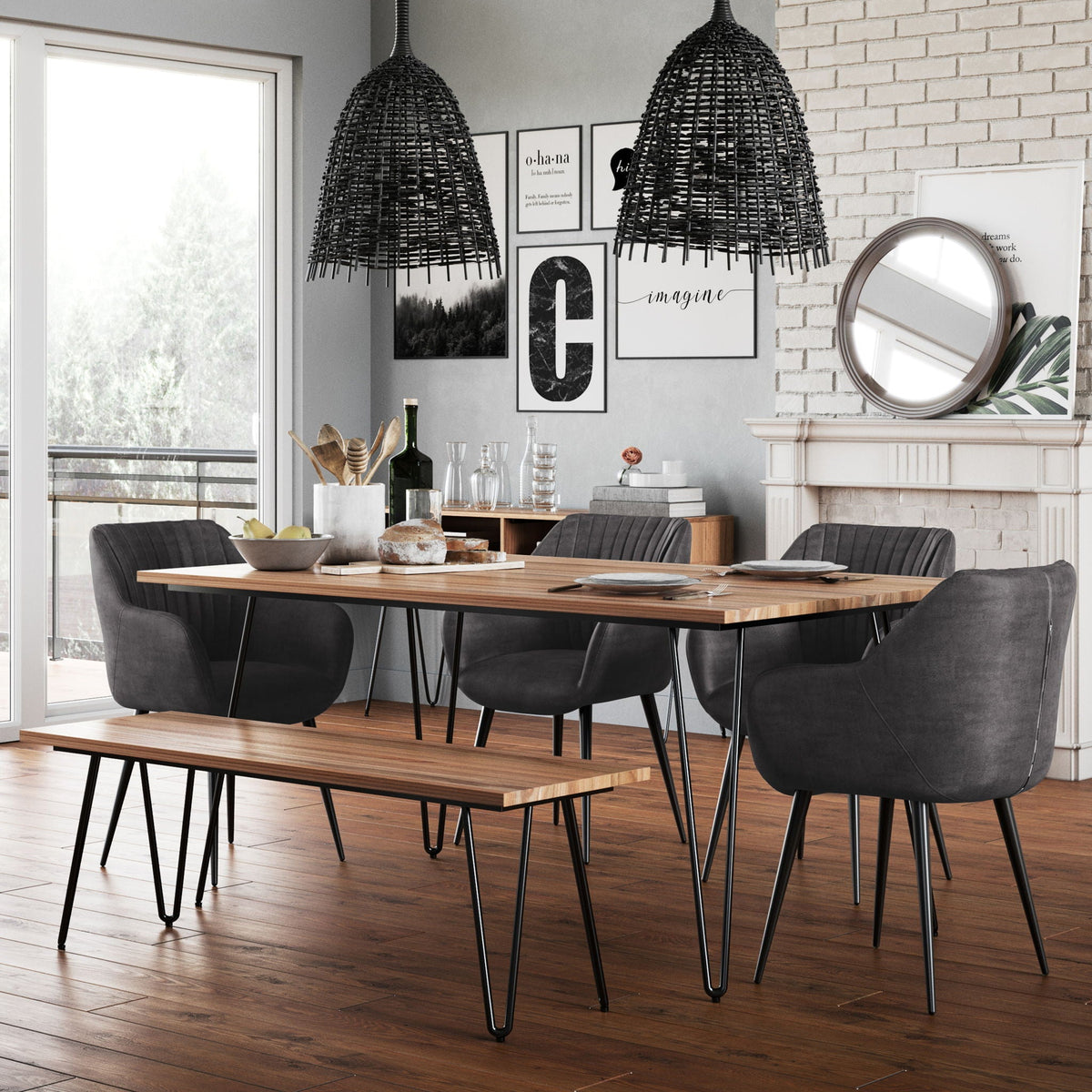 Square mango wood dining table with hairpin legs in a modern dining room with dark gray chairs on Tampa Home & Garden Store