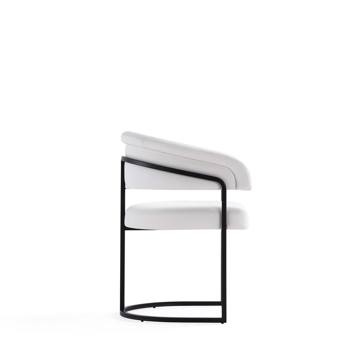 Geometric base dining chair with white vegan upholstery and black cantilever frame on Tampa Home & Garden Store