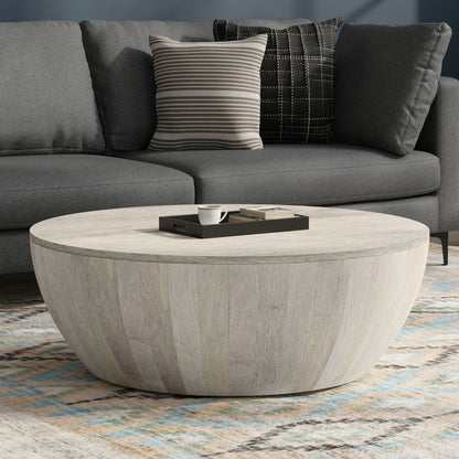 Elmbrook Drum Coffee Table in light wood with a rounded drum base and marble-like top on Tampa Home & Garden Store
