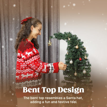 5 Ft Prelit Bent Top Christmas Tree with 300 LEDs and Metal Stand, held by a woman in a red sweater on Tampa Home & Garden Store