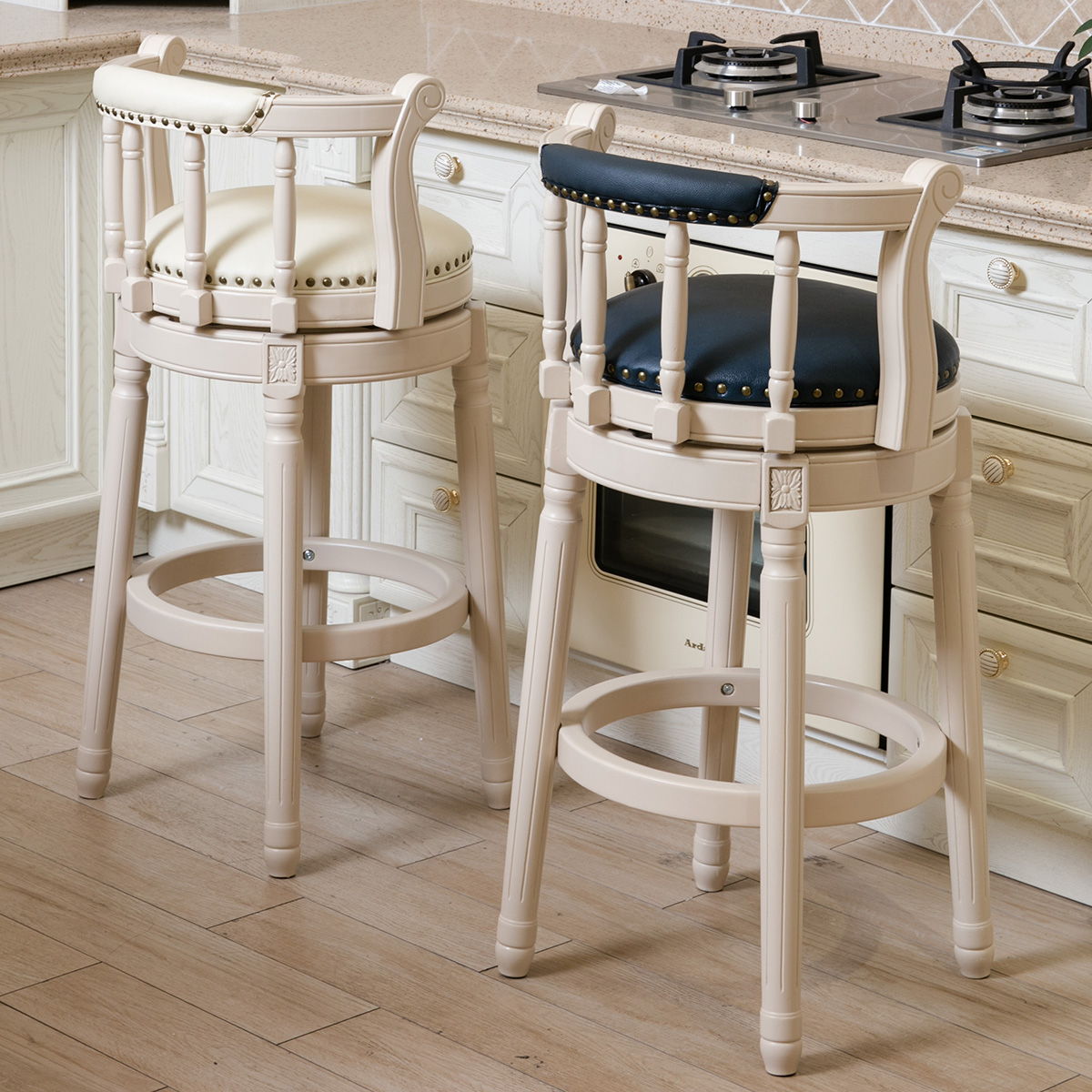 Pair of cream finish wooden bar stools with swivel; blue seat on one stool, HouseOfZazla on Tampa Home & Garden Store