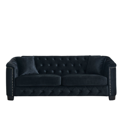 Modern Chesterfield sofa in black velvet with tufted backrest and nailhead trim on Tampa Home & Garden Store