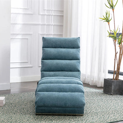 Massage chaise lounge in teal blue upholstery with segmented cushions for indoor use on Tampa Home & Garden Store