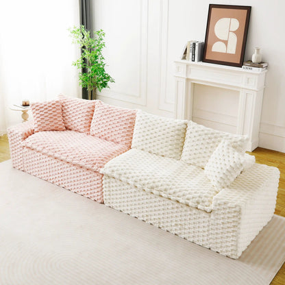 Multifunctional sofa with pink and white chunky knit throws by Unique Piece Furniture on Tampa Home & Garden Store