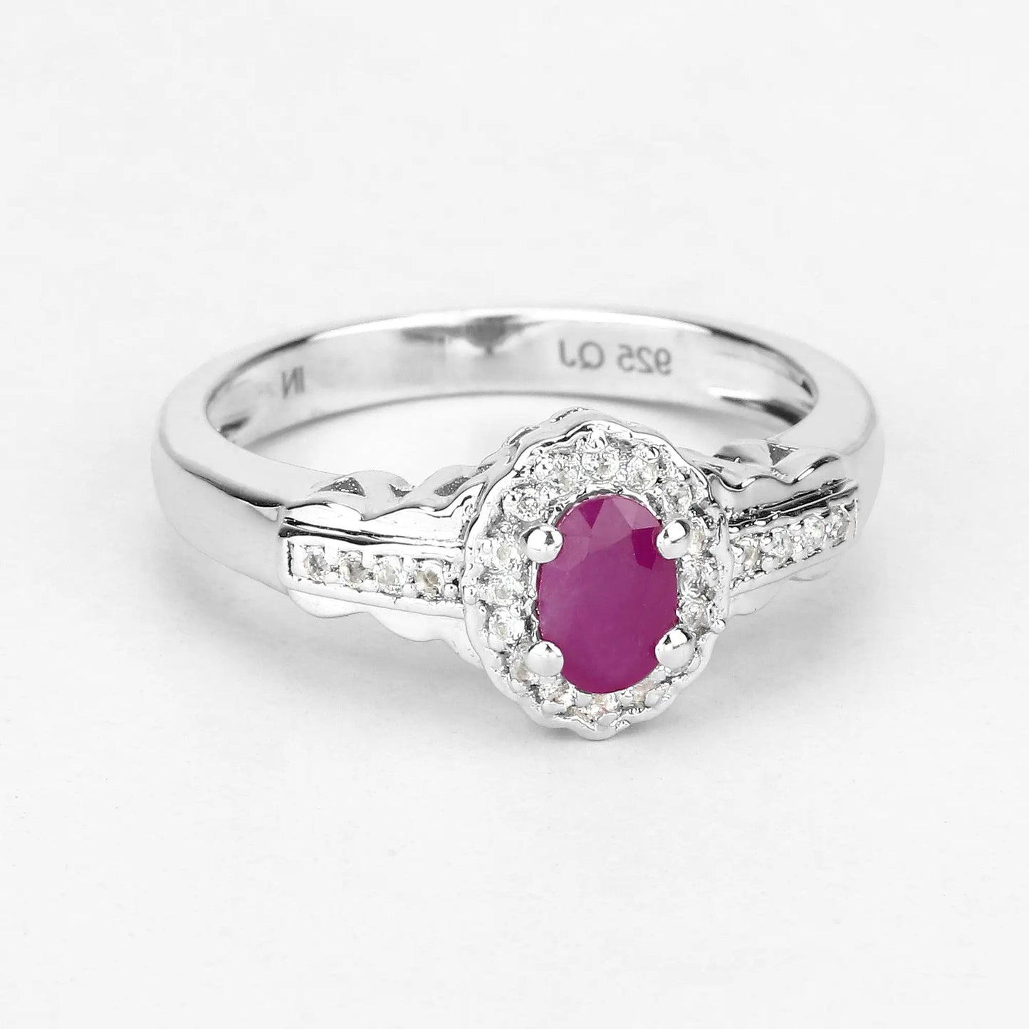 Ring with pink ruby center stone and white topaz halo in sterling silver on Tampa Home & Garden Store