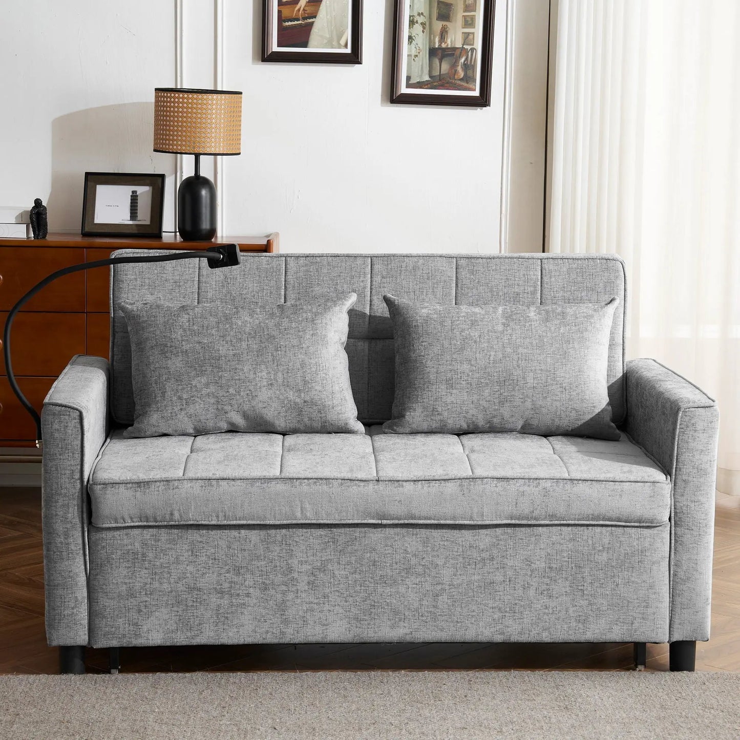 Gray fabric sleeper loveseat with two-seat cushions and straight arms in living room on Tampa Home & Garden Store