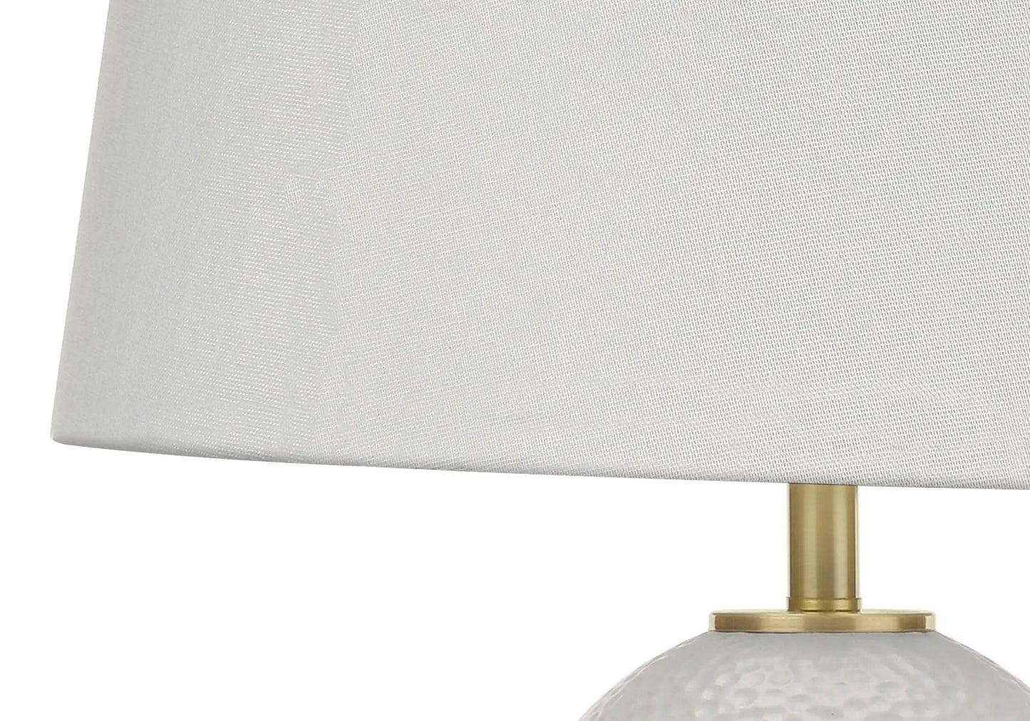 Table lamp white ceramic base with hammered texture and brass stem, white fabric shade on Tampa Home & Garden Store