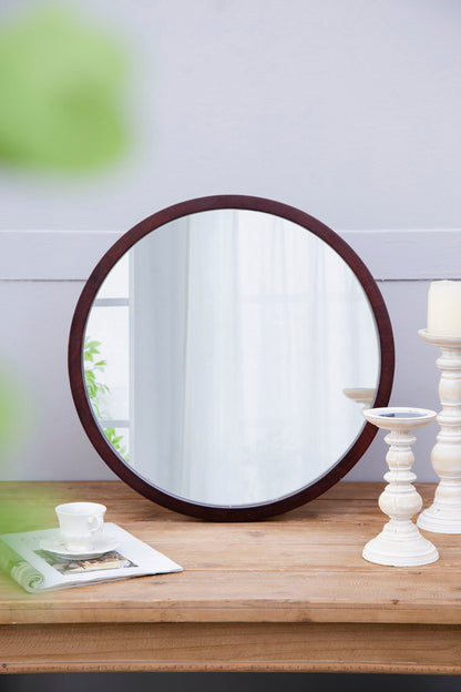Circle wall mirror with dark wooden frame by HouseOfZazla for living room on Tampa Home & Garden Store