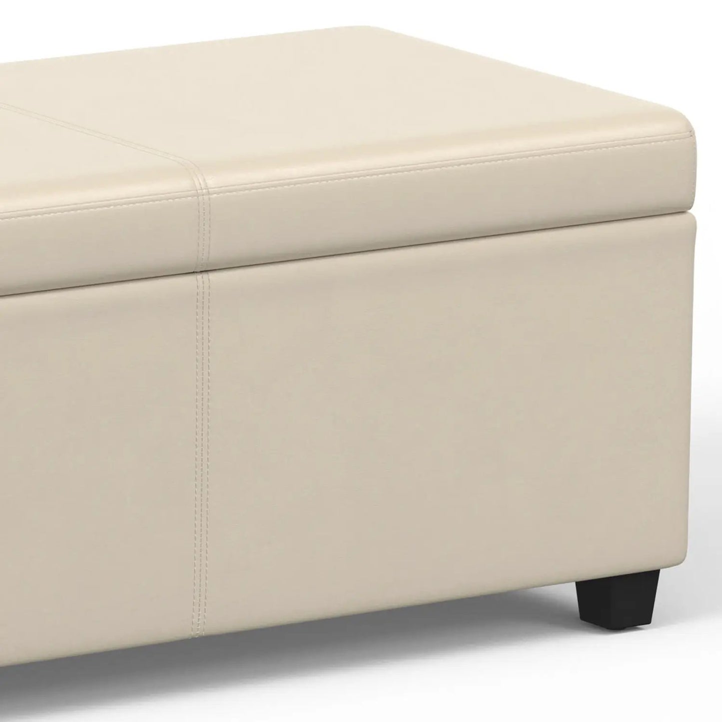 Avalon storage ottoman bench in beige faux leather with clean stitched seams and chunky legs on Tampa Home & Garden Store