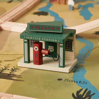 Tiny Land 1920 Railway train table service station in green with Texaco sign and red pump on Tampa Home & Garden Store