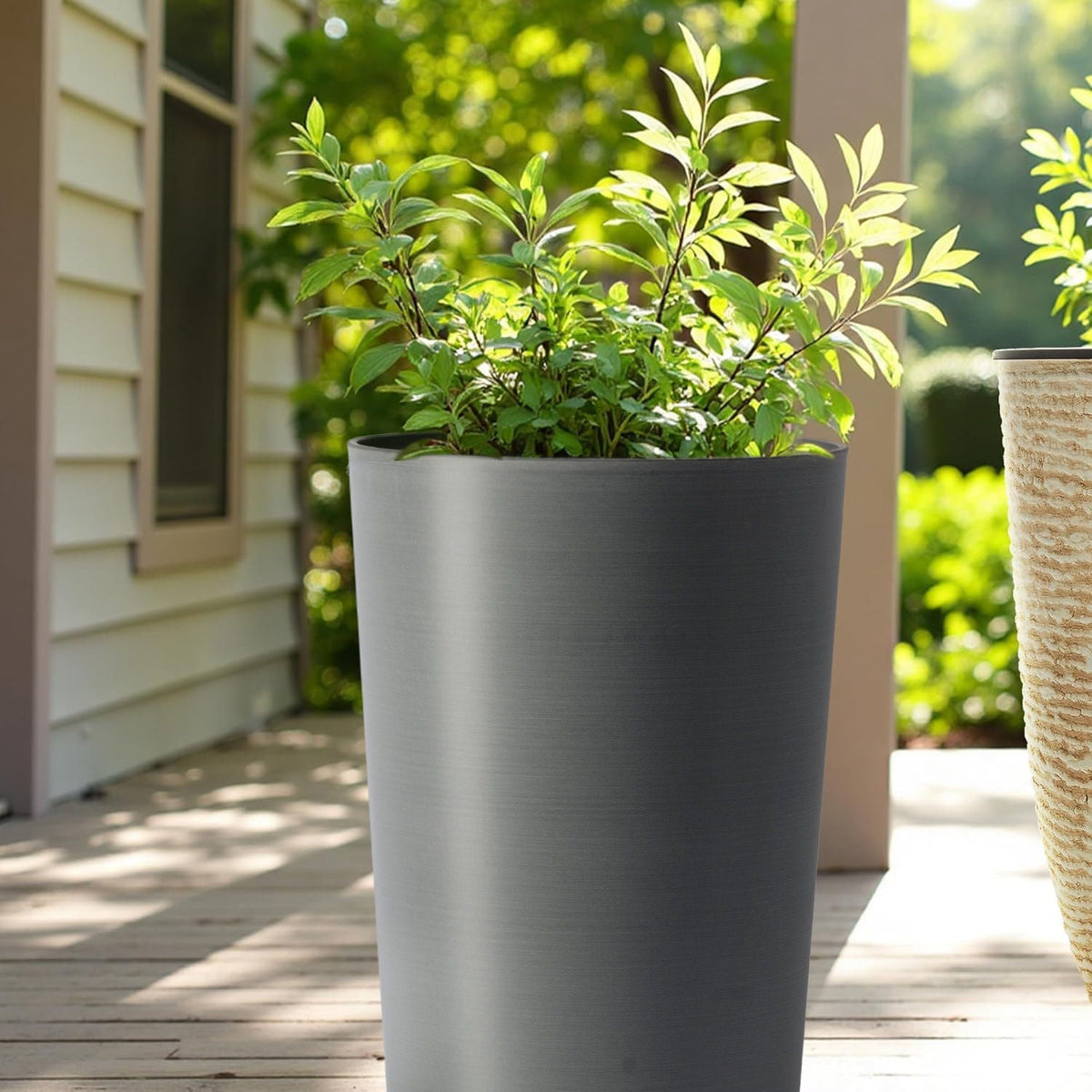 Planter For Outdoor, matte gray planter with green foliage on a wooden deck on Tampa Home & Garden Store