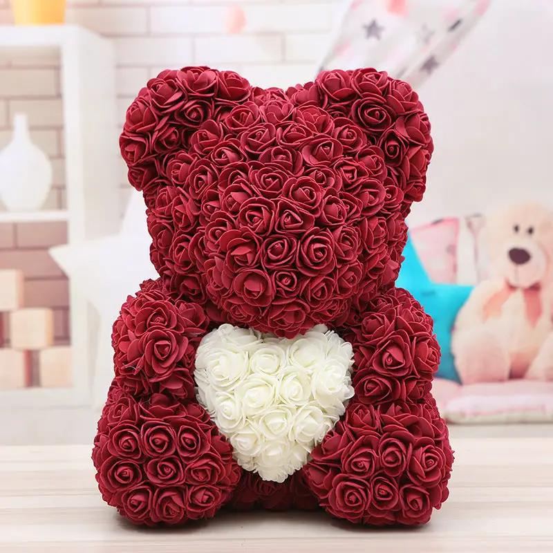 Rose bear sculpture made of red roses with a white rose heart, perfect Valentine's gift on Tampa Home & Garden Store