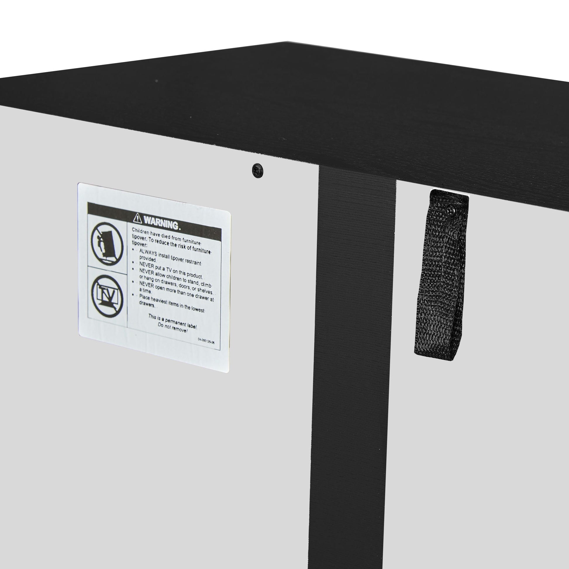 Tall storage cabinet top edge in black woodgrain with hardware and warning label on Tampa Home & Garden Store