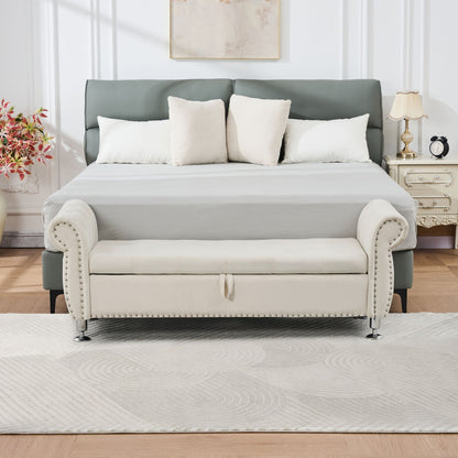 Storage bench with crystal button tufting and light cream upholstery at foot of gray bed on Tampa Home & Garden Store