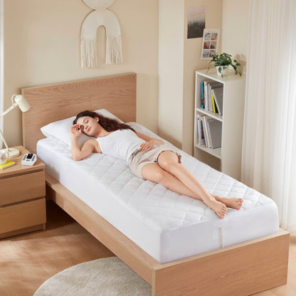 1-Piece Full Heated Mattress Pad HouseOfZazla on white quilted mattress in beige bedroom on Tampa Home & Garden Store