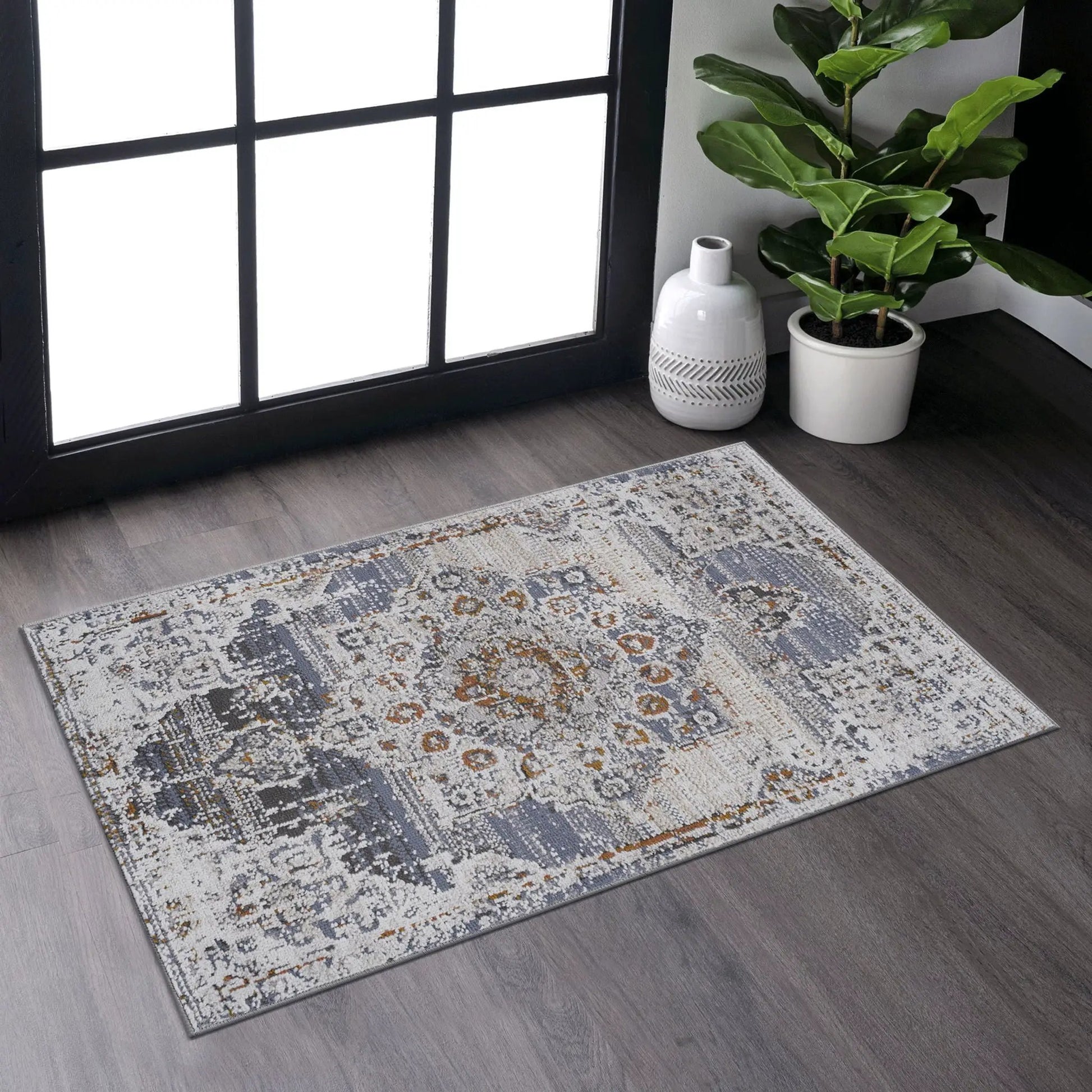Payas medallion rug, blue-gray ivory palette, distressed pattern, area rug on Tampa Home & Garden Store