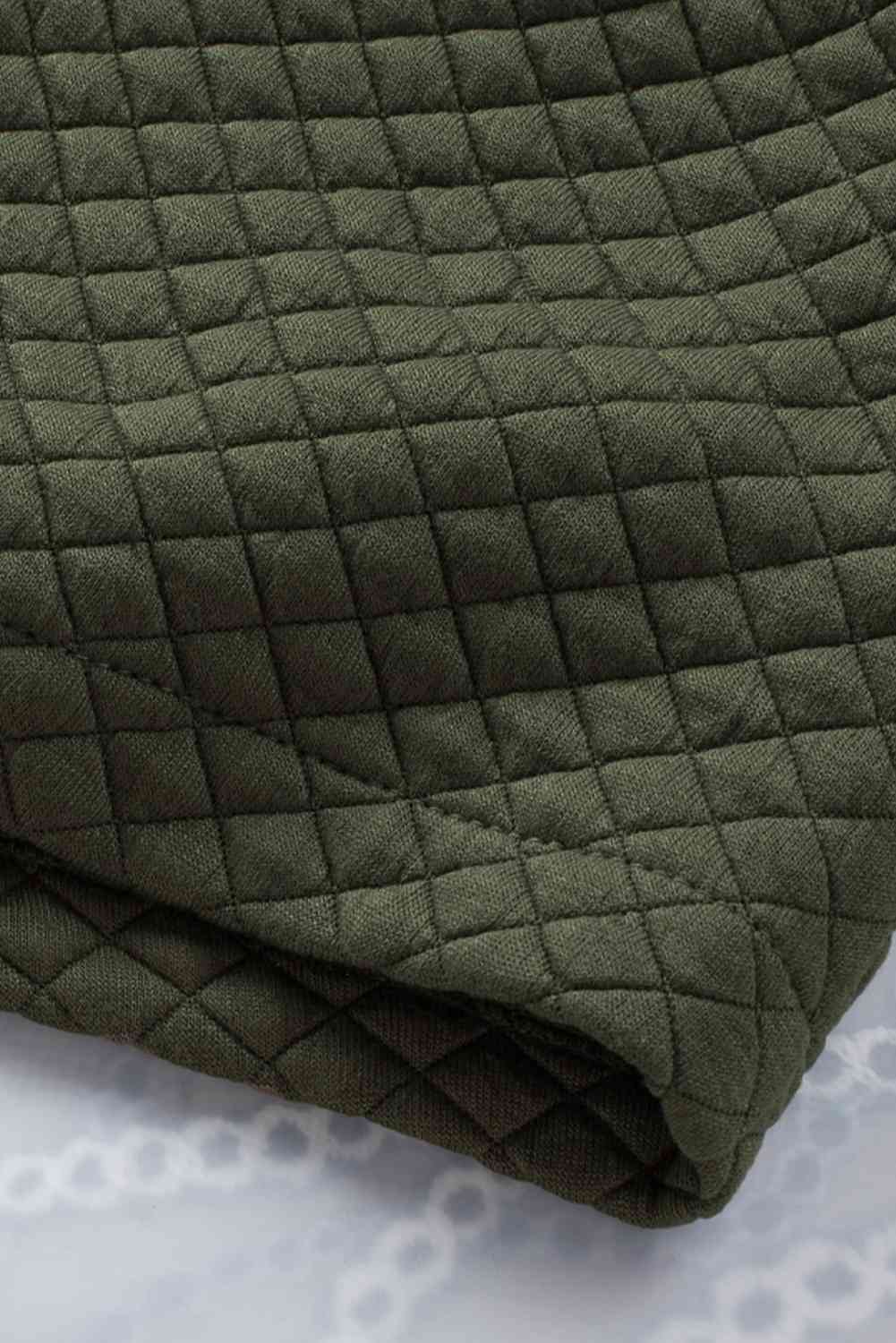 Comfortable button-down collared quilted jacket in olive green with diamond stitching on Tampa Home & Garden Store